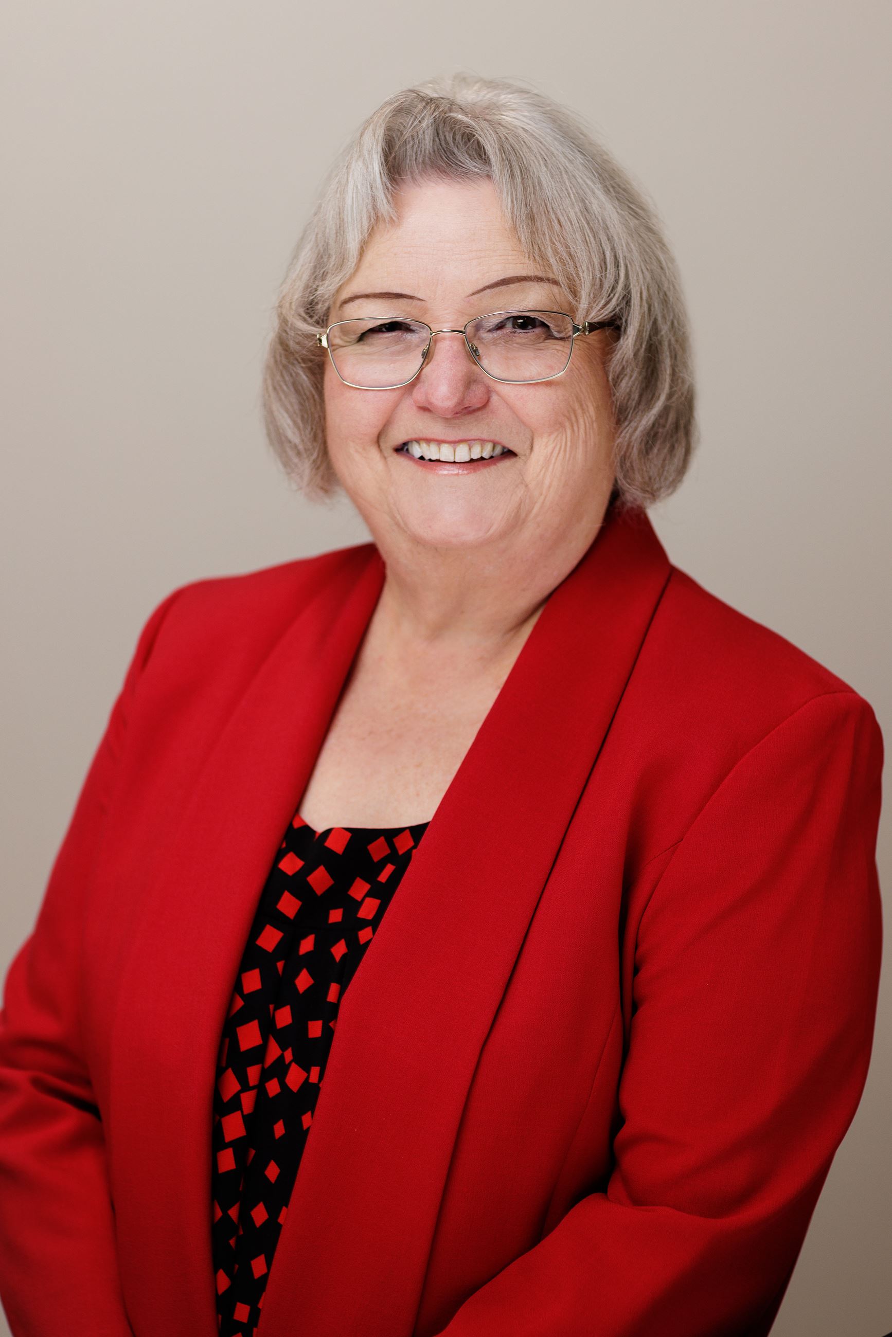 A person wearing glasses.