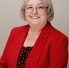 A person wearing glasses.