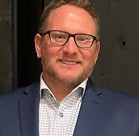 A man wearing glasses.