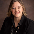 A person smiling for the camera.