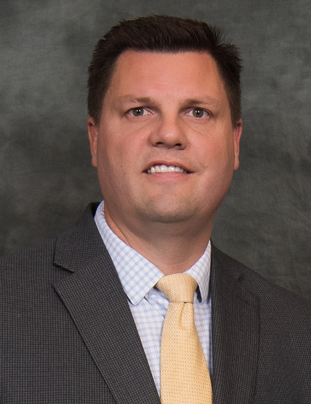 A man in a suit and tie.