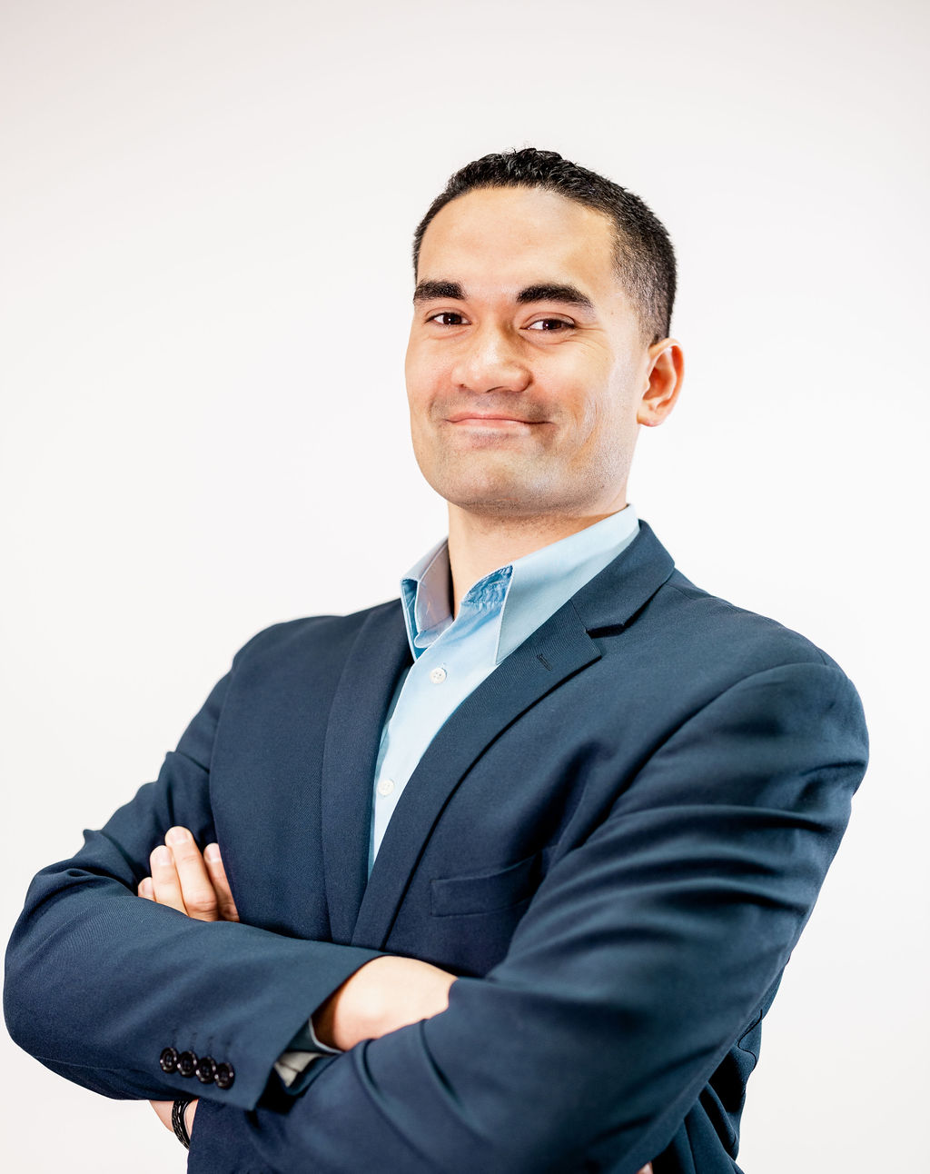 A man folding his arms.