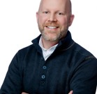 A man with his arms crossed.