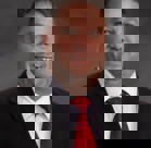 A man in a suit and tie.