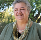 A person smiling for the camera.