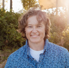 A man smiling for the camera.