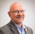 A man wearing glasses.