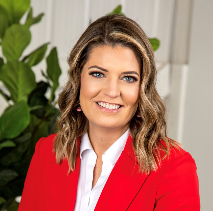 A person smiling for the camera.