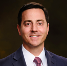 A man in a suit and tie.