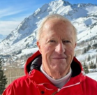 A man in red jacket.