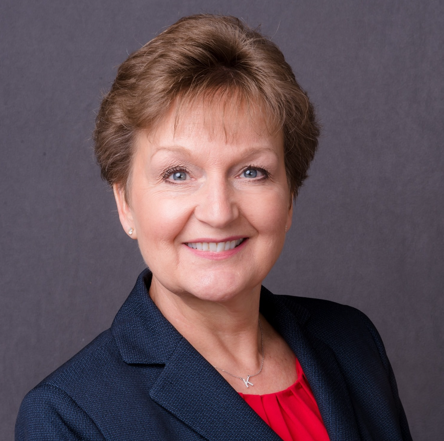 A person smiling for the camera.