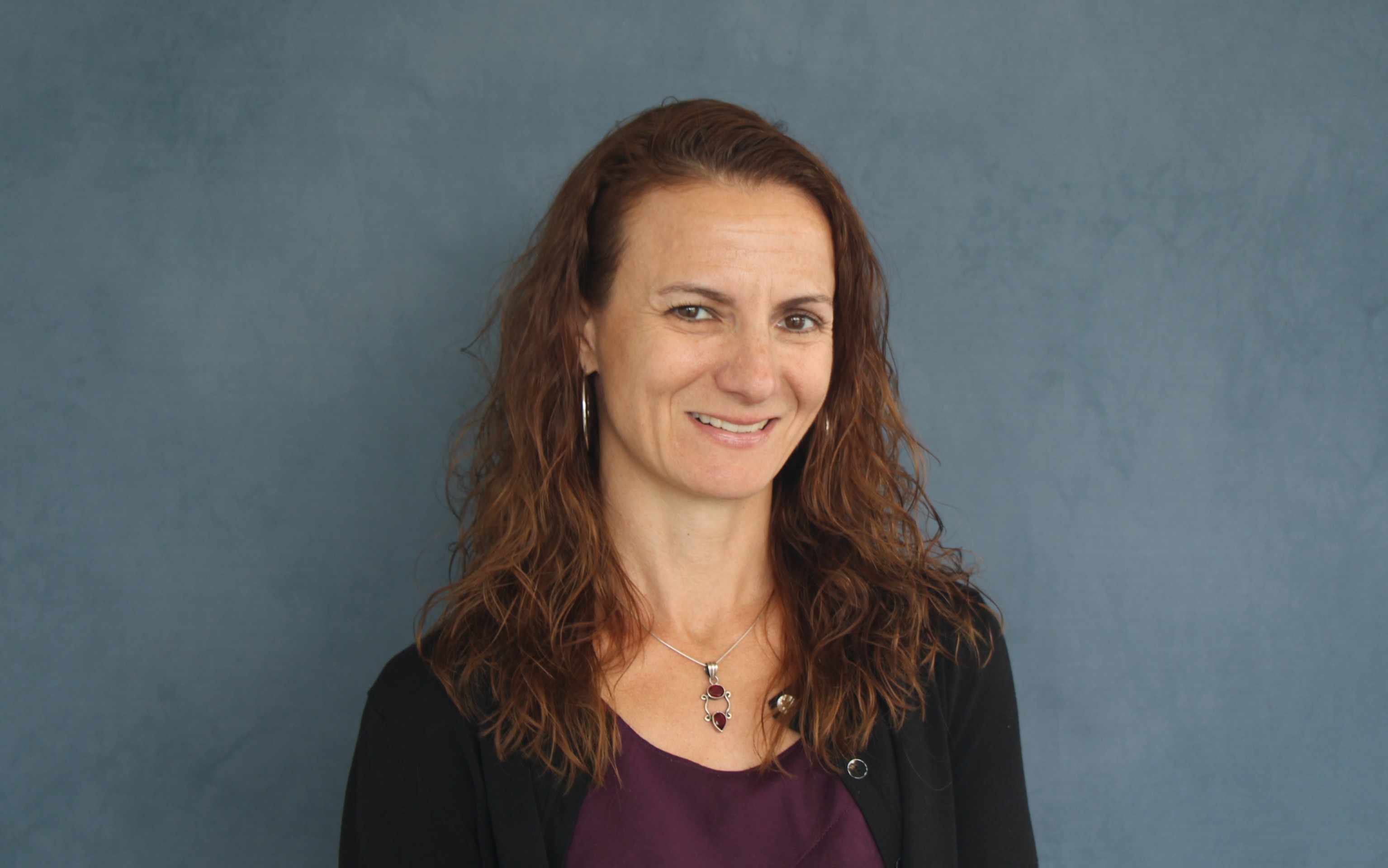 A person smiling for the camera.