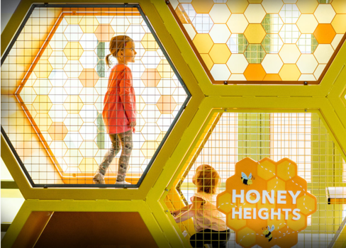 A  child in a exhibit in Discovery Gateway.