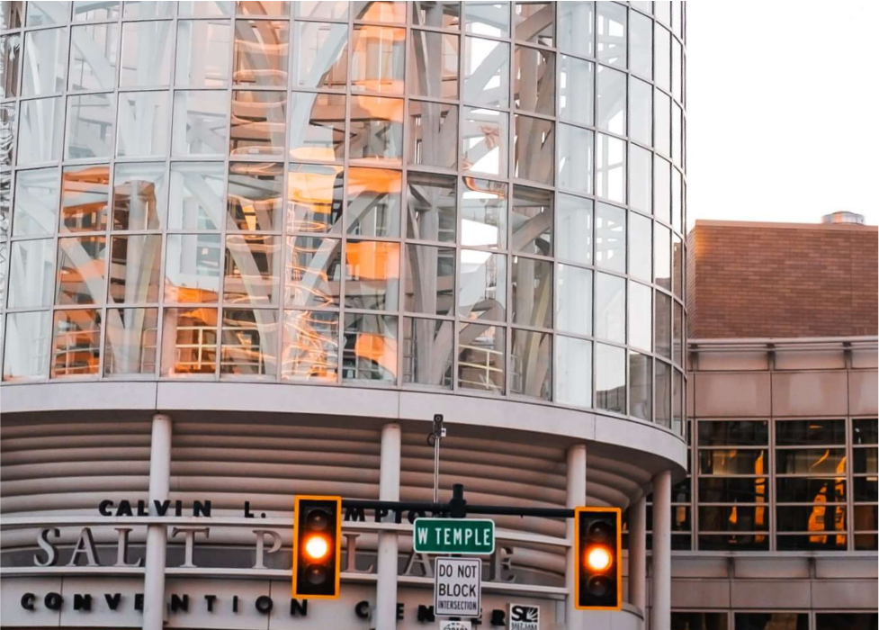 A traffic light sits in front The Salt Palace
