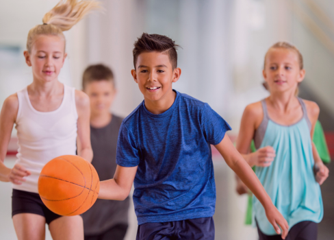Moulay Hassan, Crown Prince of Morocco et al. playing basketball.