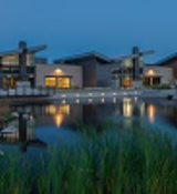 A body of water with buildings around it.