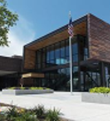 A building with a flag on the front.