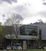 A building with trees in front of it.