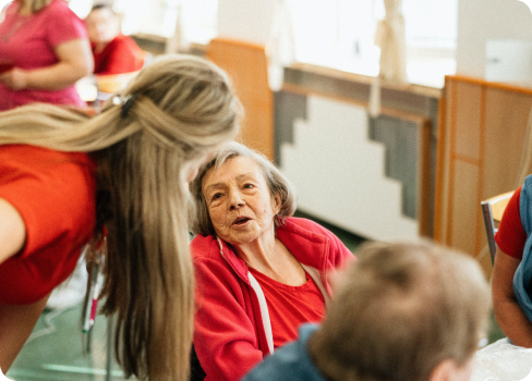 A group of people sitting in a room.