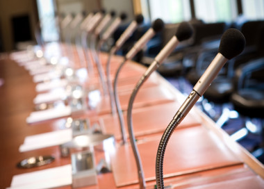 A microphone on a desk.