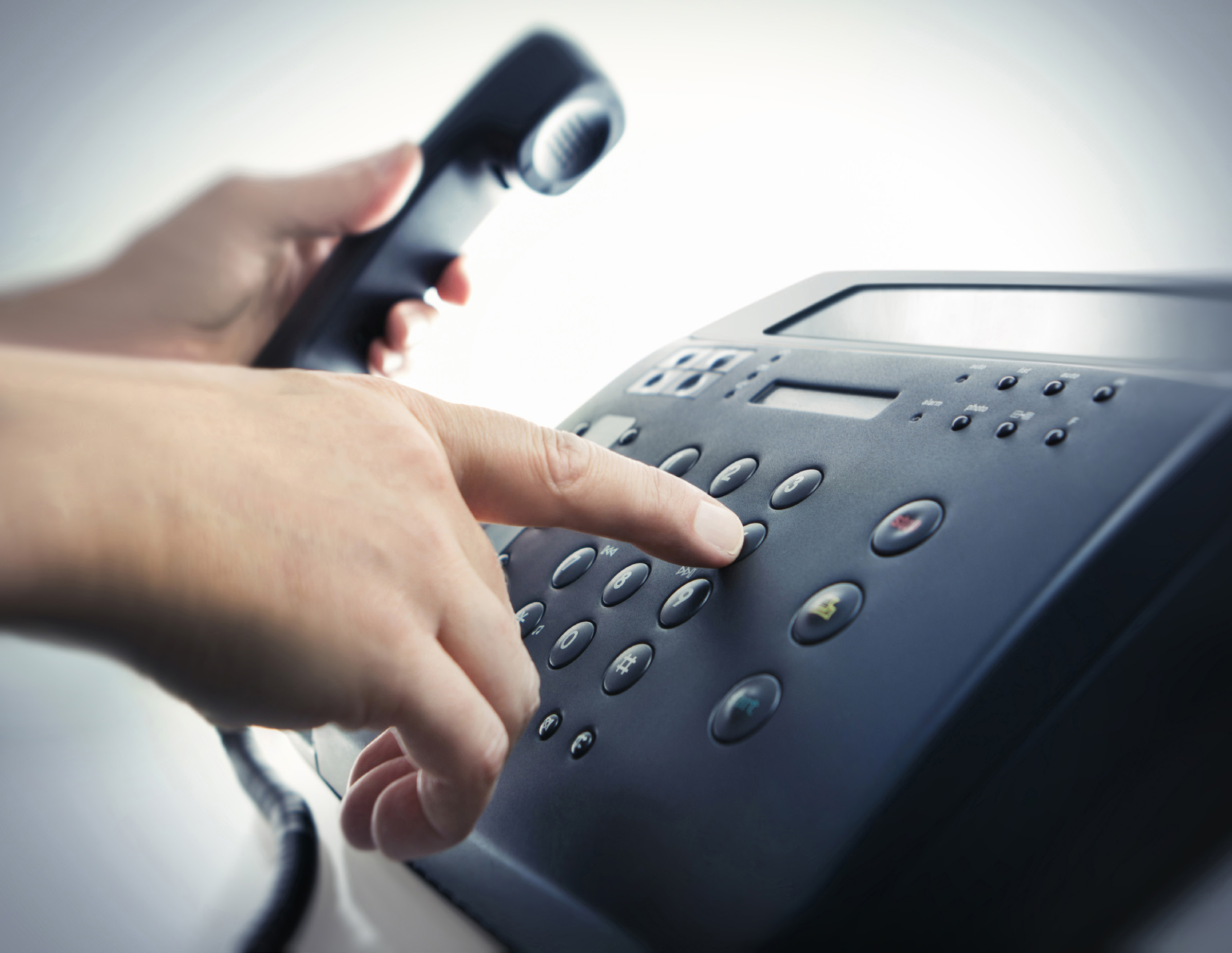 A person using a phone.