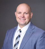 A man in a suit and tie.