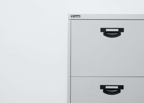 A silver rectangular object.