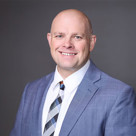 A man in a suit and tie.