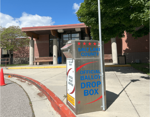A gas station with a sign.