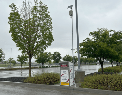 A parking meter on the side of a road.