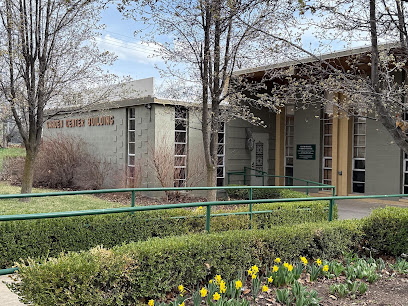A building with a fence in front of it.