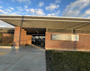 A building with a sign on the front.