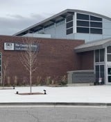A building with a sign on the front.