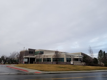 A building with a parking lot.