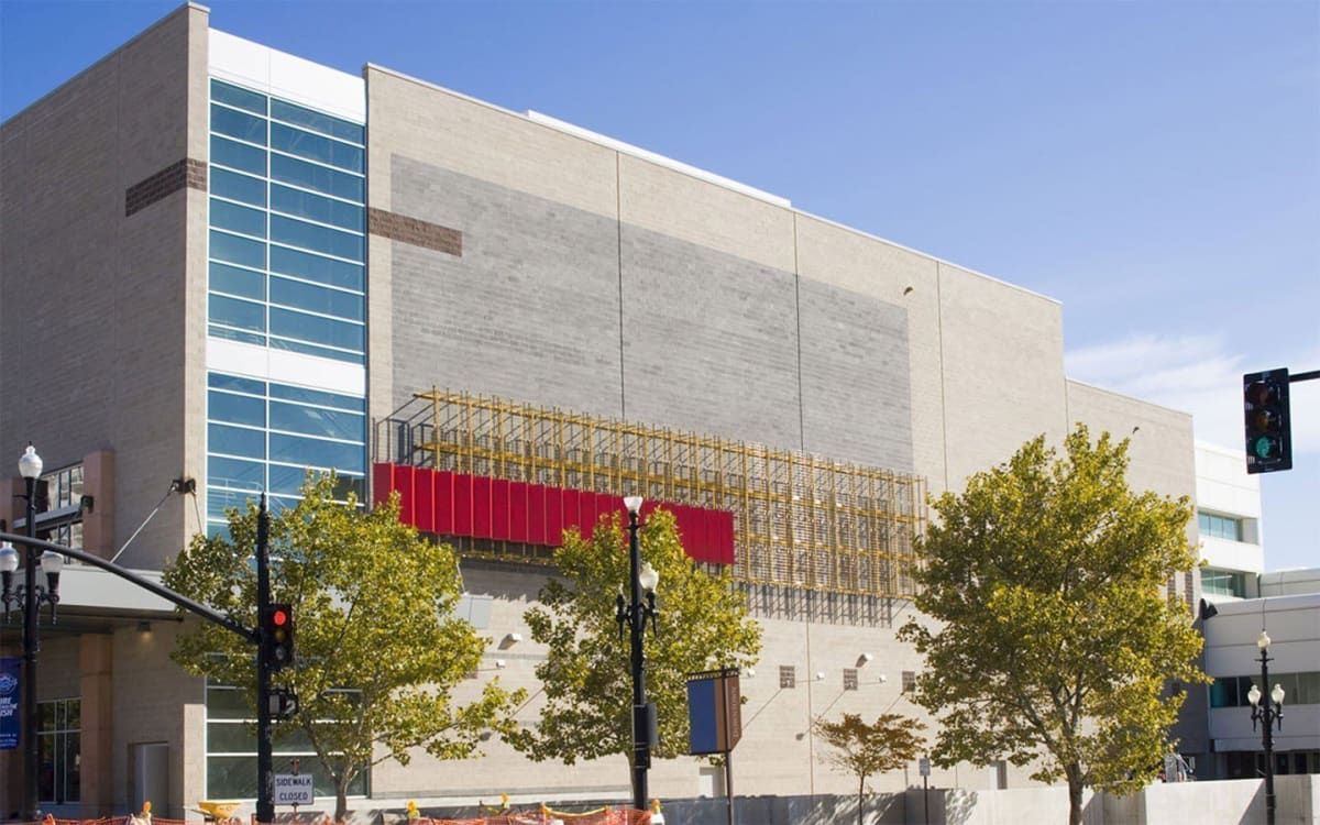 A large building with a street light.