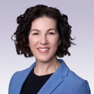 A person in a blue shirt.