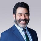 A man smiling for the camera.