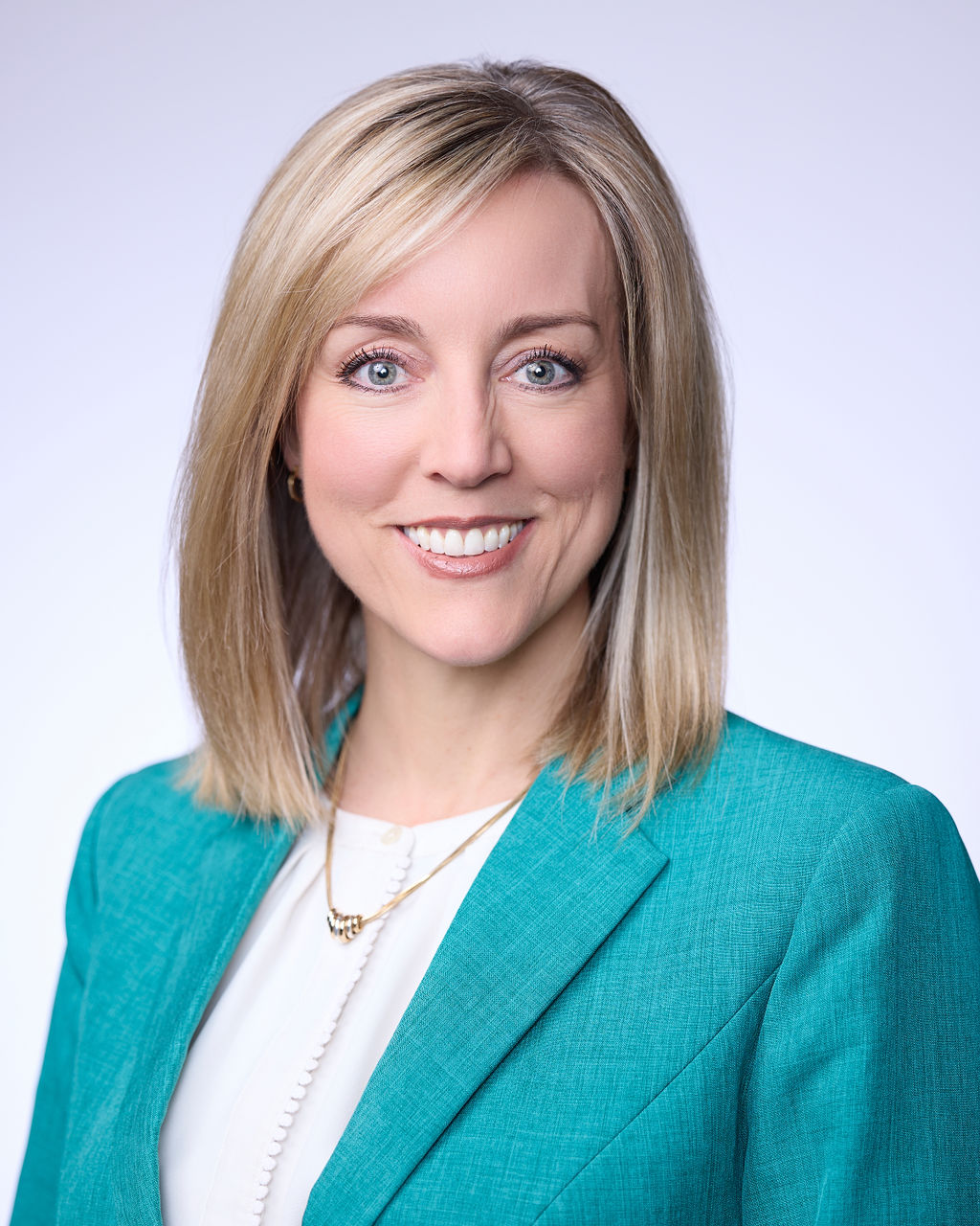 A close-up of Aimee Winder Newton smiling.