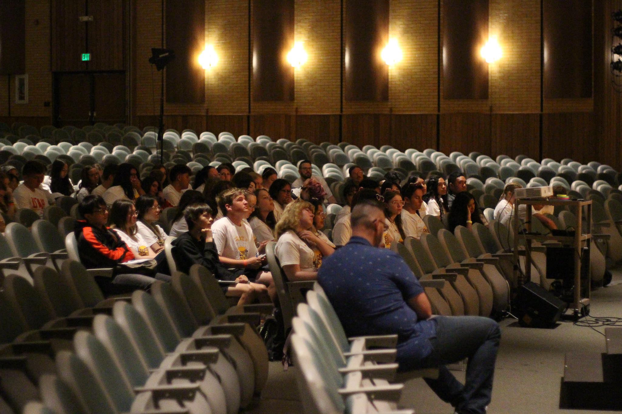 A group of people sitting in a room.