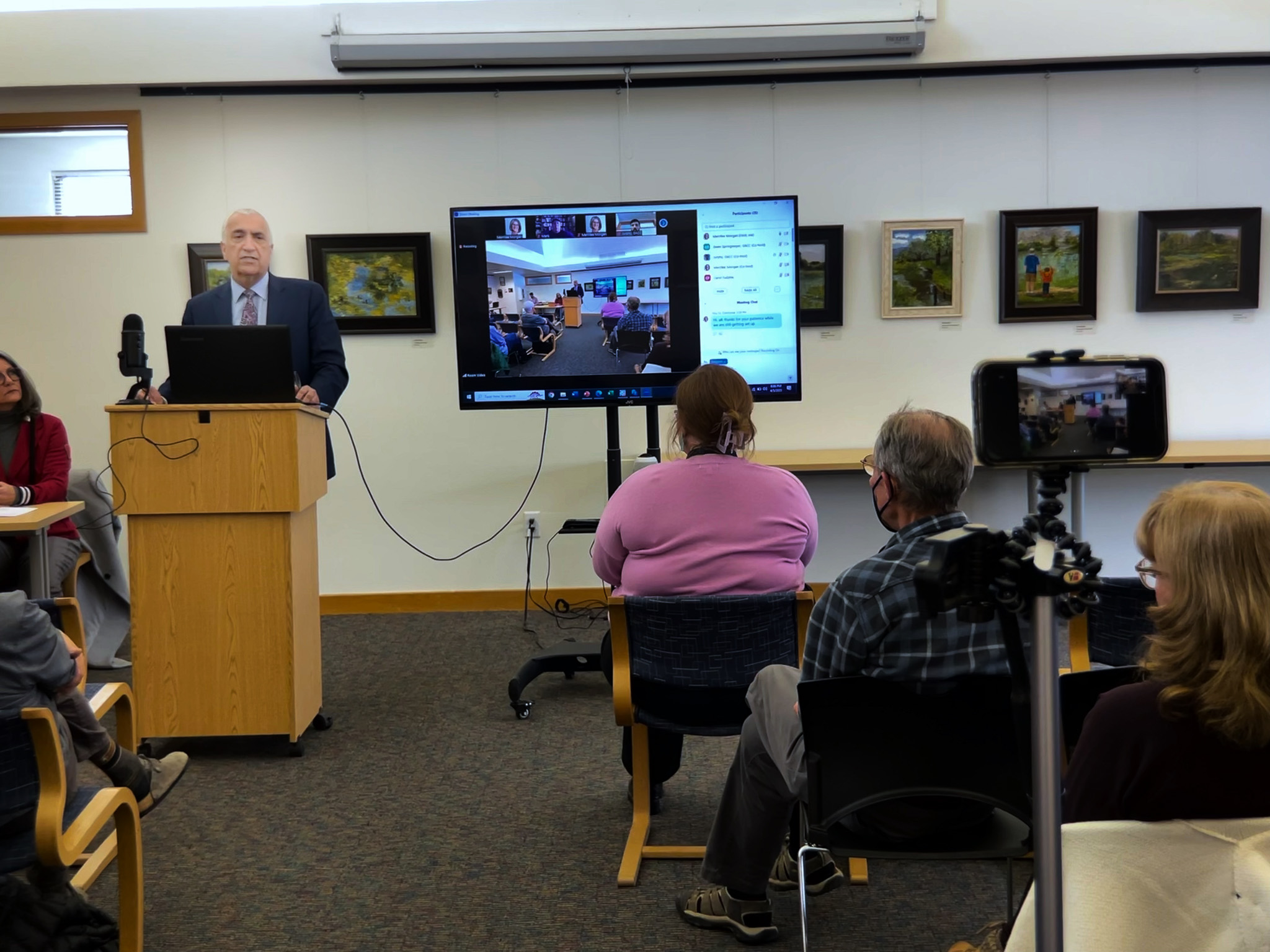 A person giving a presentation to a group of people.