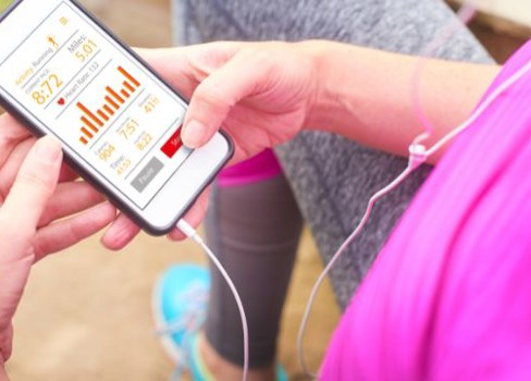 A person holding a device.