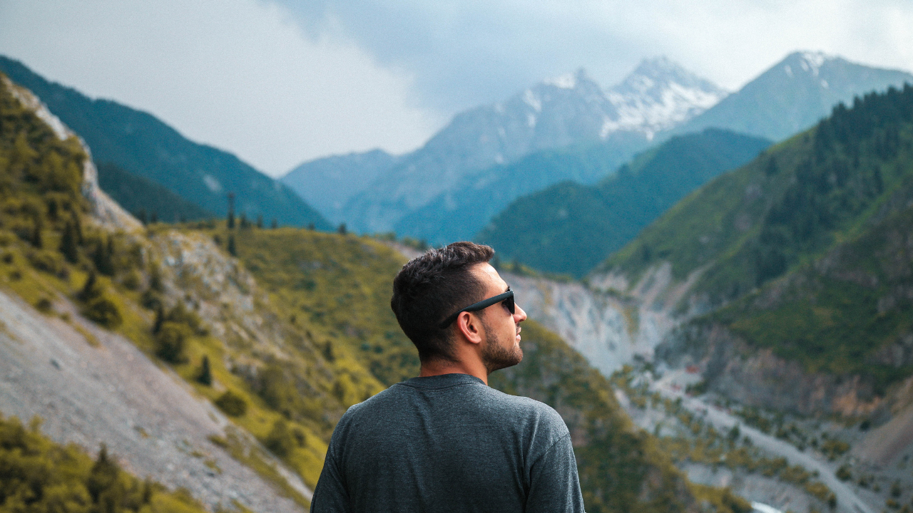 A man standing on a mountain.