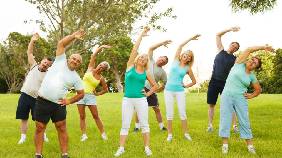 A group of people jumping in the air.