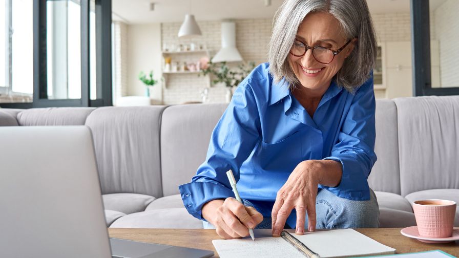 A woman sitting at a table.
