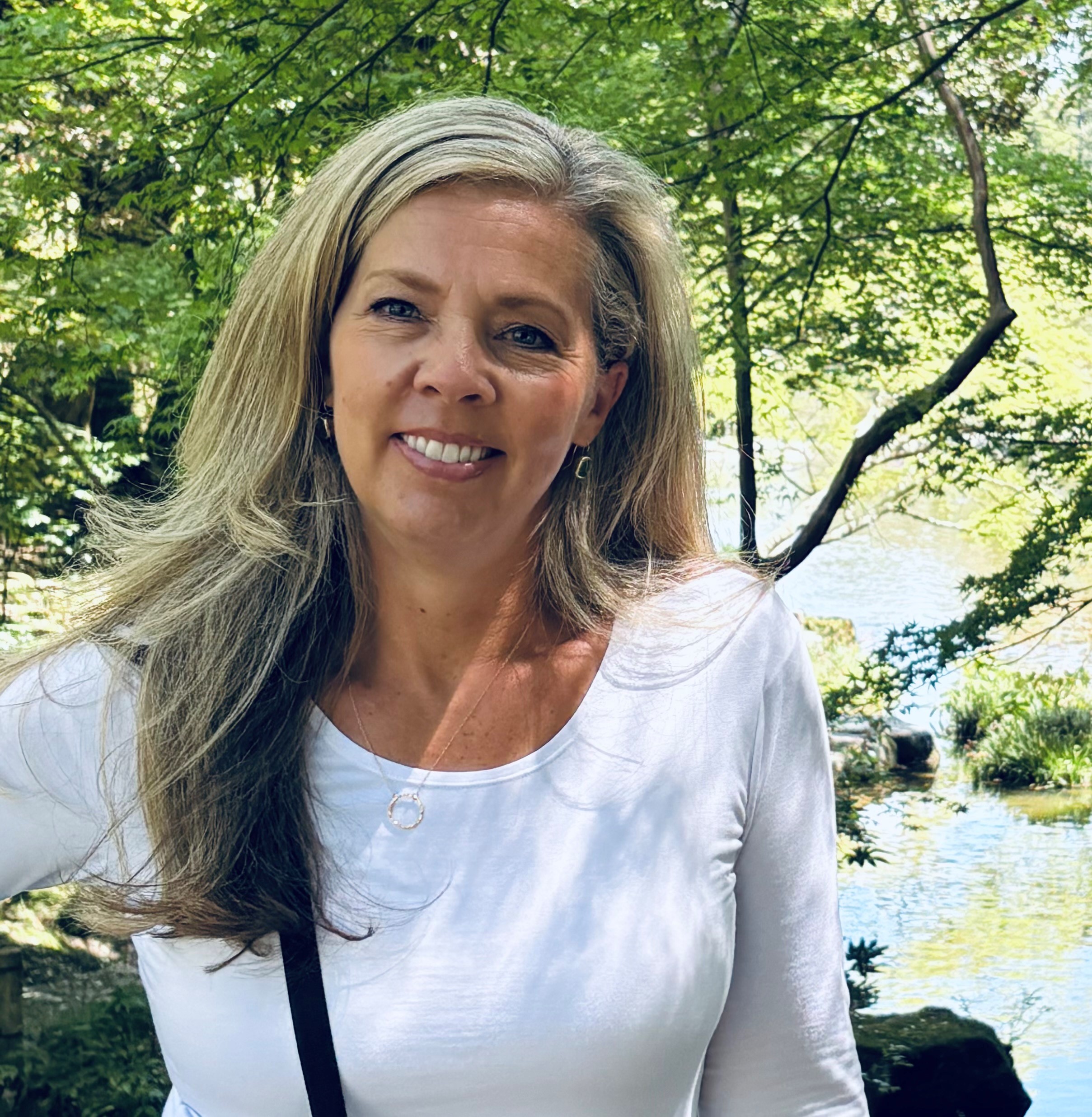 A woman smiling for the camera.