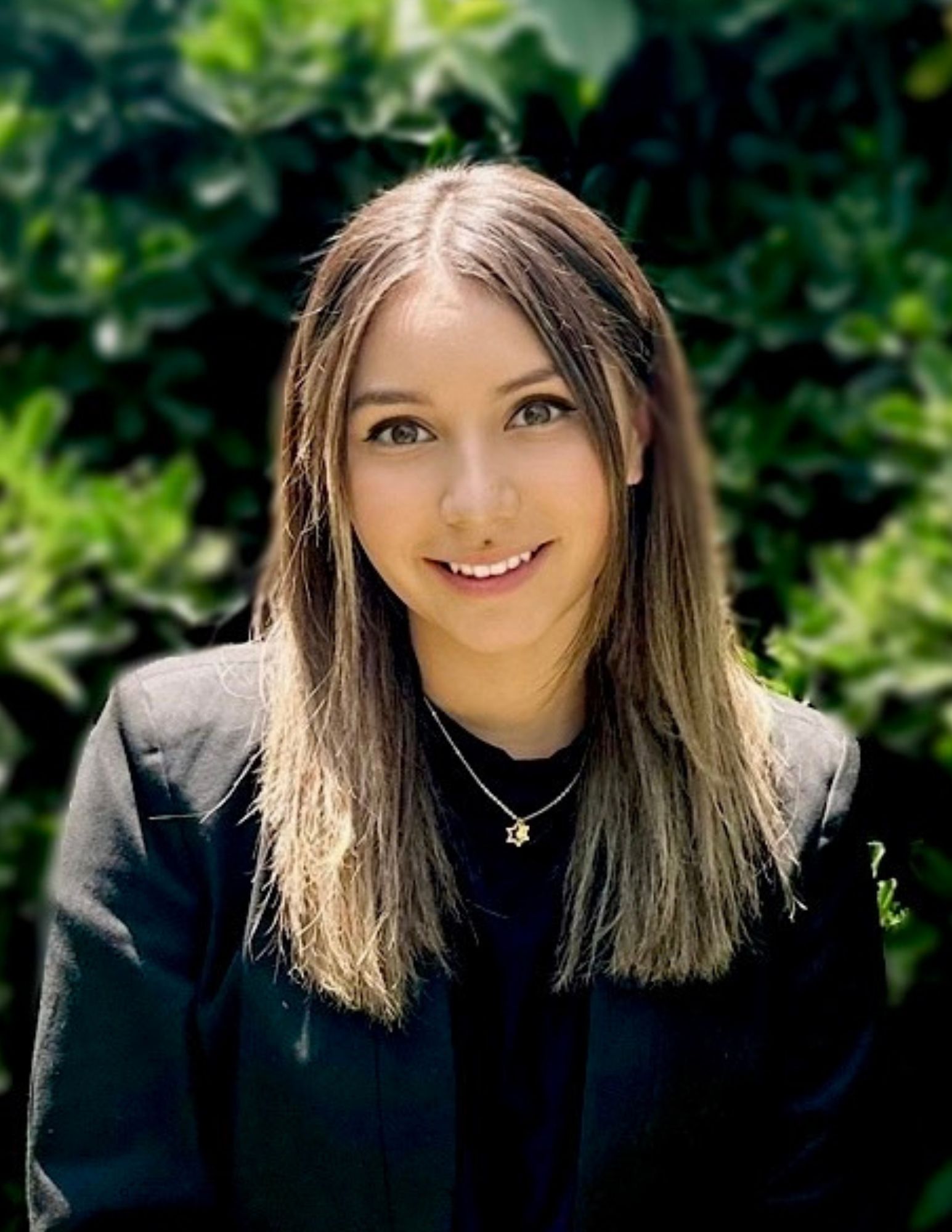 A person smiling for the camera.