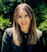 A person smiling for the camera.