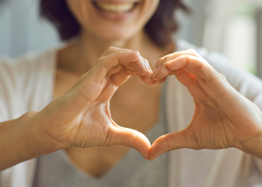 A woman holding a baby.