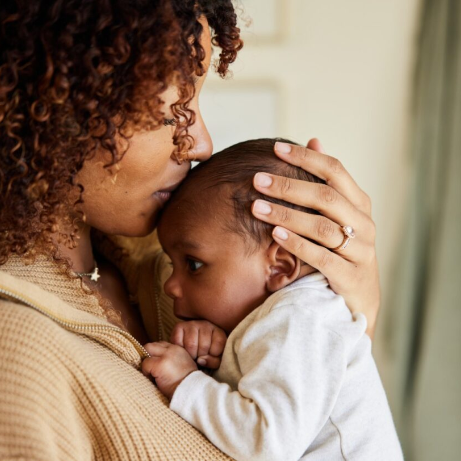 A man holding a baby.
