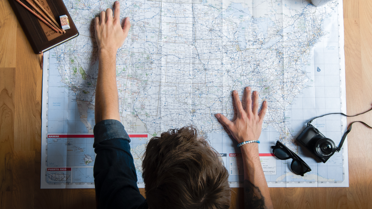A person writing on a whiteboard.